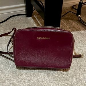 Michael Kors Jet Set Large cross body in burgundy/plum with gold hardware